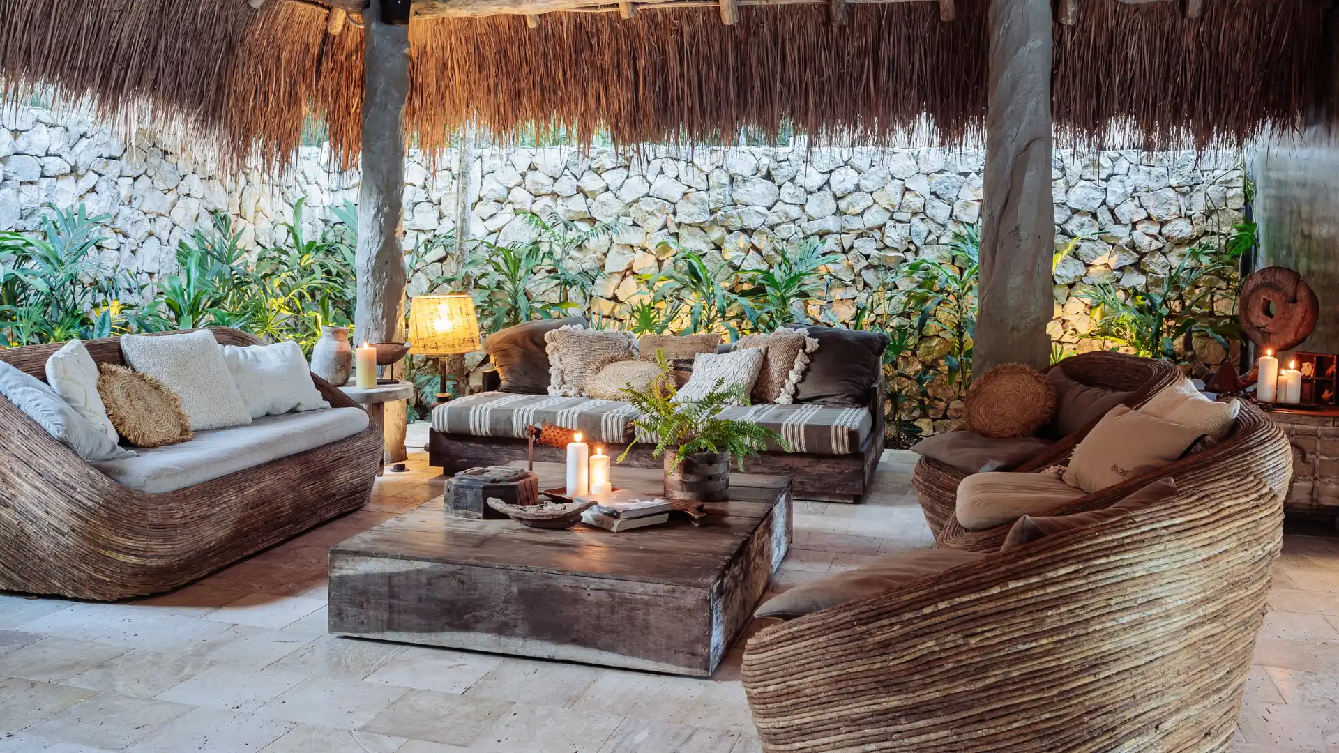 Open-air terrace surrounded by jungle in the Riviera Maya at golden hour